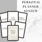 Set of personal planner books with titles on a marble background